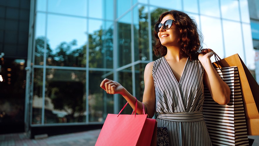 a woman with shopping bags