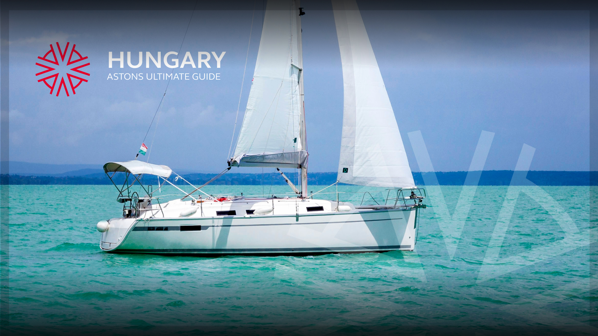 a yacht sailing on Lake Balaton in Hungary with a blue sky in the background